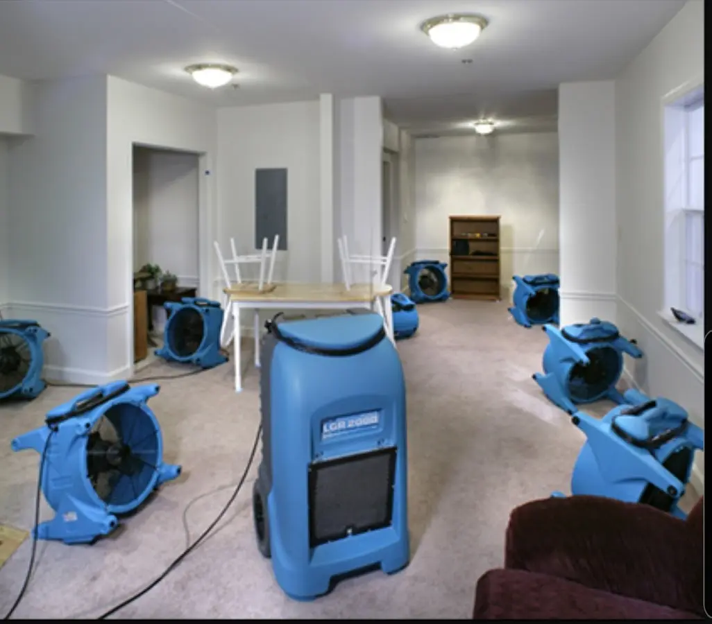 Air movers and dehumidifier setup for Water Damage Restoration in Red Bank